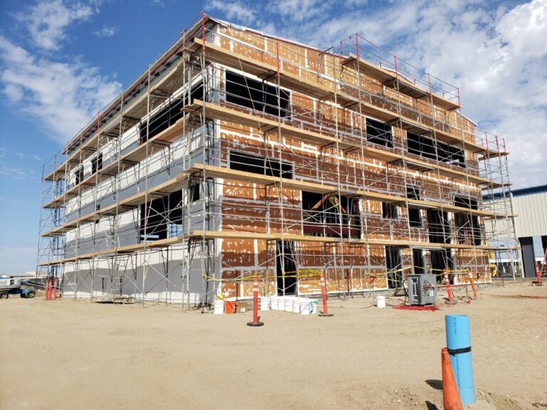 Exterior wall and building envelope work on a multi-story project